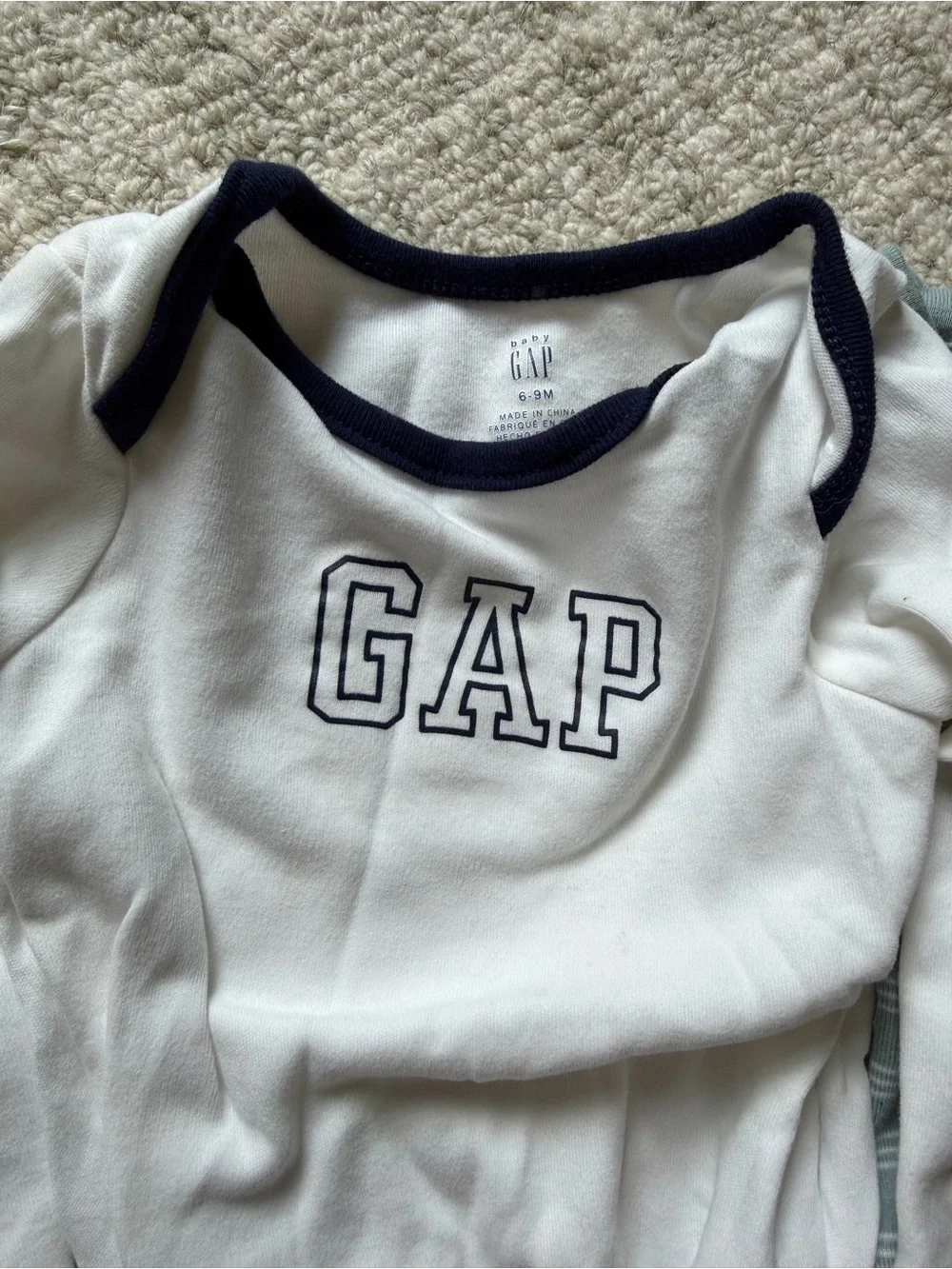 GAP, H&M & Old Navy Baby One-Piece Bodysuits in White, Navy, and Sage Green